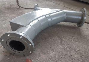 90°雙金屬復合耐磨帶背包彎頭φ180有什么特點？